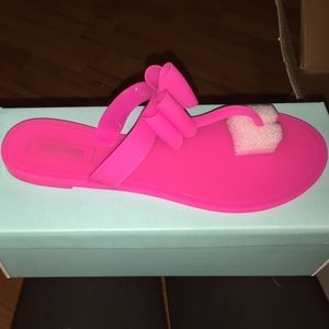 Pink jelly flip flops