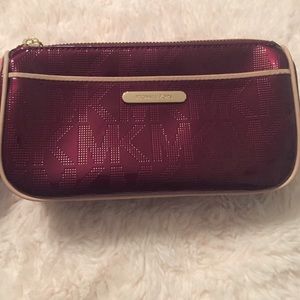 Wine colored Michael Kors makeup bag 👛💄