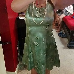 Pretty shiny green skater dress with flowers