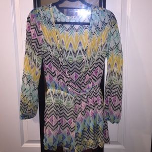 Long sleeve, multicolored romper.