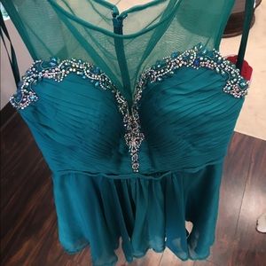 NWT la femme teal dress never been worn