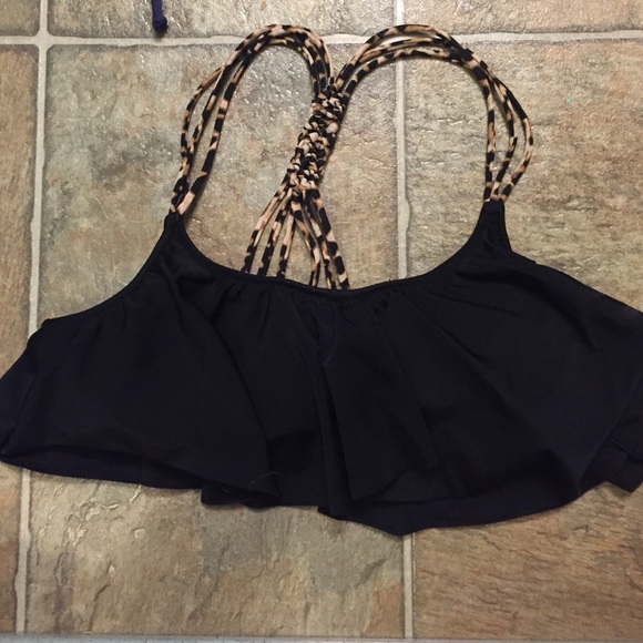 Black flowy swimsuit with cheetah print straps