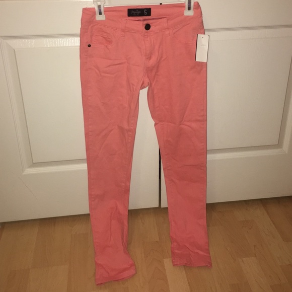 Womens coral jeans size 5!! Never worn, new w tags