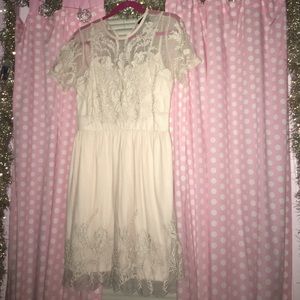 Embroidered pale pink dress