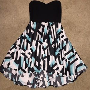 Patterned, slight high low dress.
