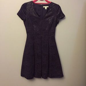 Dark purple pleated midi length dress