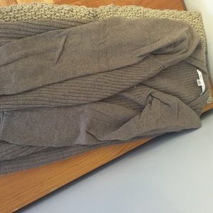 Never worn, wool cardigan.