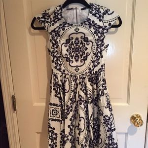 Dress with cap sleeves & a flared skirt