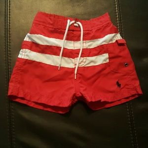 red and white little boy swim trunks