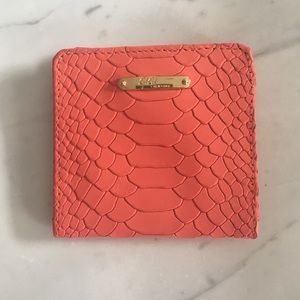 GiGi New York fold over wallet embossed Python