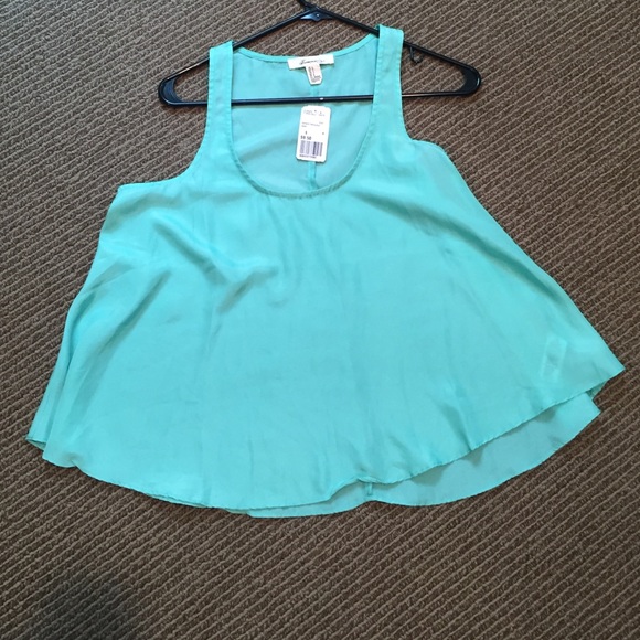 Teal flowing tank