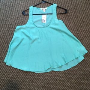 Teal flowing tank