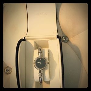 Women's Movado Bareleto Diamond Bangle watch.