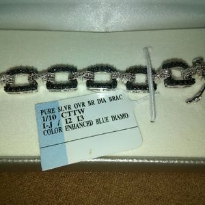 White and blue diamond and silver bracelet