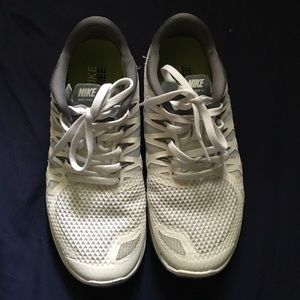 White and grey Nike free 5.0