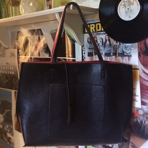 SOLD Reversible faux black/red leather tote!