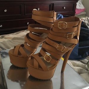 Strapped ankle high heels