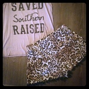 Leopard shorts with pom pom hem