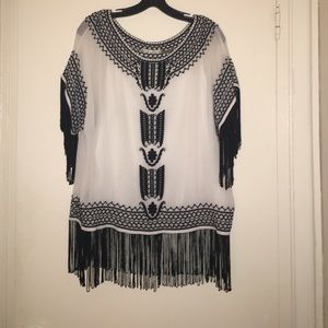 Alice and Olivia white and black fringe blouse.