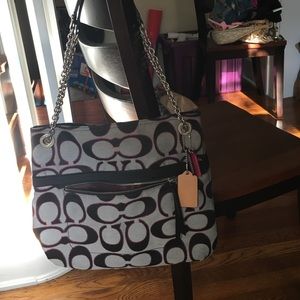 Used gray, black and pink Coach bag
