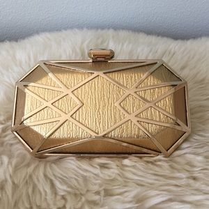 Beautiful gold statement clutch (like new!)