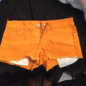 Orange denim shorts