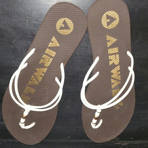 Airwalk flip flops.