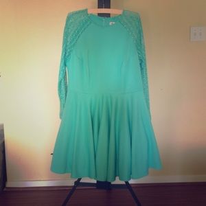Dress with long mesh sleeves.