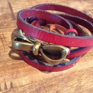 Leather fossil belt with brass bow