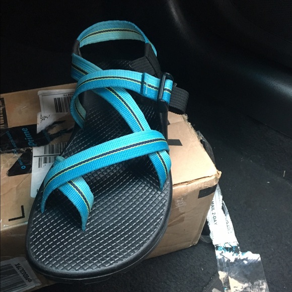 Chacos size 8 Teal, black, yellow straps.