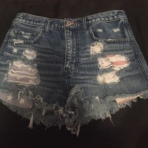 Dark washed, distressed Hollister shorts