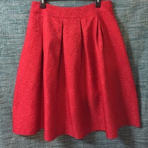 A line pleated skirt.