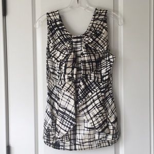 BCBG black & white top with front ruffle