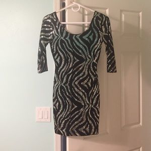 Back and silver sequence dress