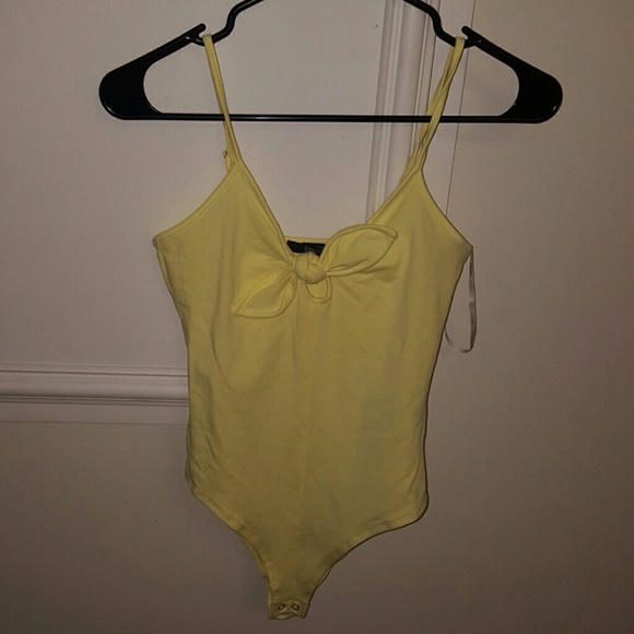 NOT AVAILABLE Baby yellow bodysuit - Picture 1 of 3