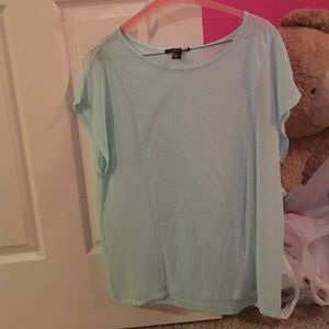 Woman's light blue top