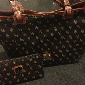 Dooney and Bourke bag with matching wallet.