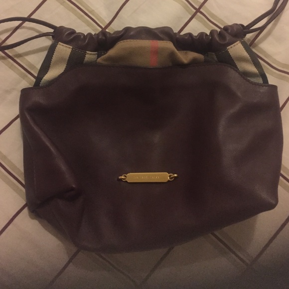 Burberry "little crush" wine side bag.