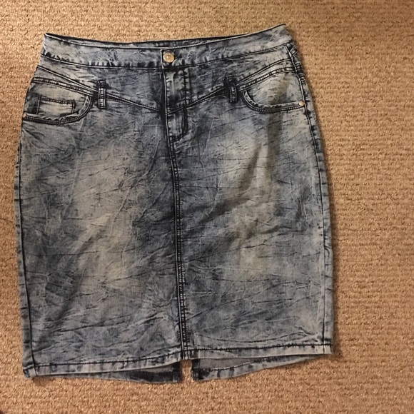 A distressed denim pencil skirt