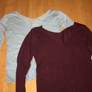 Two v-neck acrylic knitted sweaters.