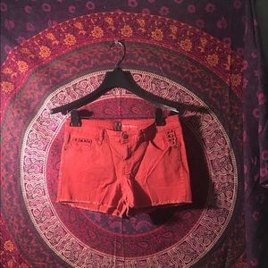 Orange denim shorts
