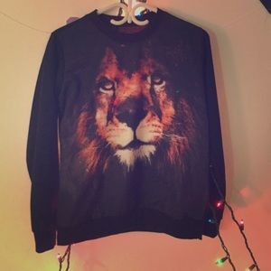 Long black sleeve shirt with lion on it