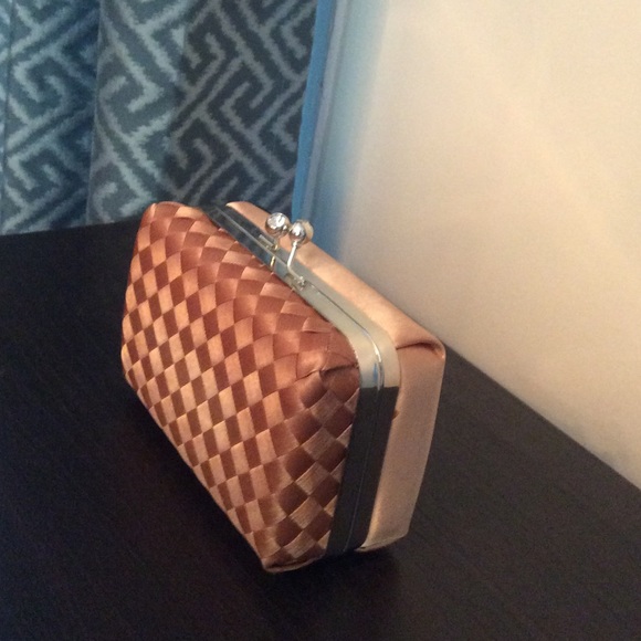 Champagne Woven mini clutch .