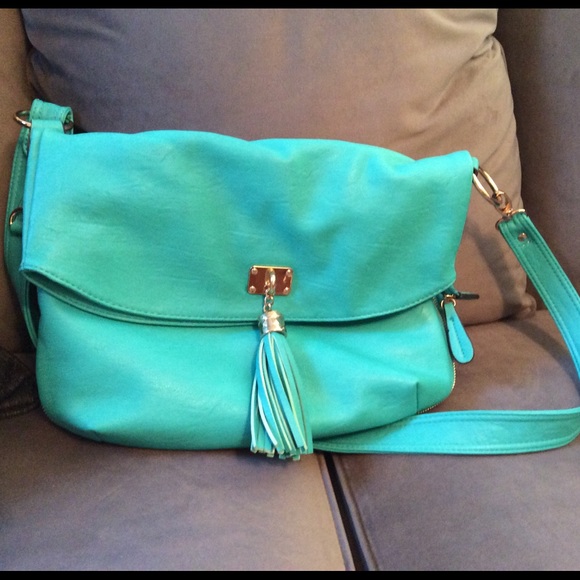 Aldo Teal Tassle bag.