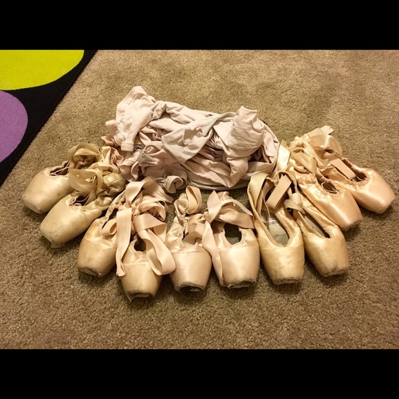 Lot of used ballet shoes and tights