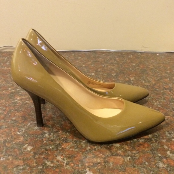 Tan patent leather pumps. Never been worn.