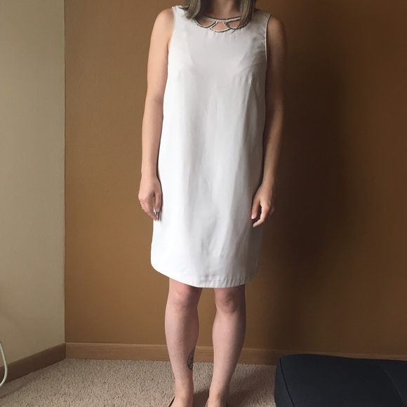 Pale pink shift dress with bead detail