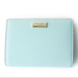 Light blue Kate Spade wallet.