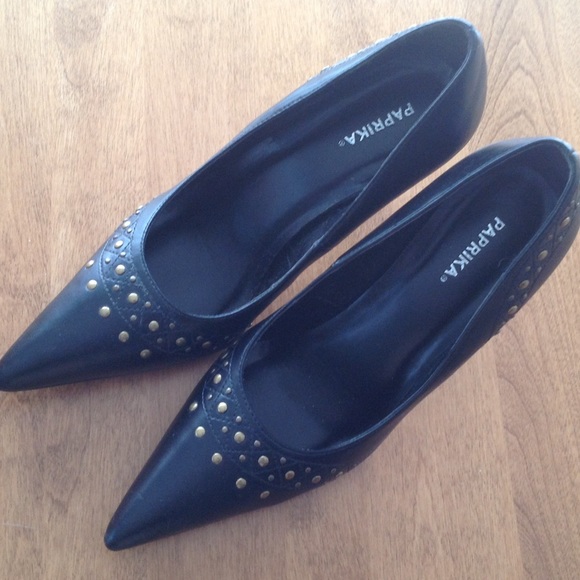 Black faux leather with gold stud detail. NWOT