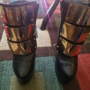 Privileged black booties with gold buckle